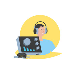 young man with earphones and audio console