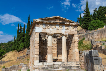 Fototapeta na wymiar Athenian treasury at the ancient delphi site in Greece