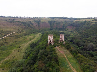 Fototapeta na wymiar Ruins of the castle in Nirkov, towers of the Chervonograd castle, Ukraine. Nirkov, Dzhurin waterfall.