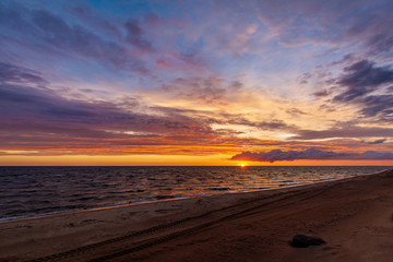Fototapeta na wymiar Sunset on the lake. Pskov region