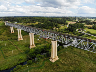 Fototapeta na wymiar Railroad bridge of Lyduvenai, Lithuania. Longest bridge in Lithuania