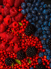 super antioxidants. superfood. mix of fresh berries, rich with resveratrol, vitamins, raw food ingredients. nutrition background, nutrient-rich foods are good for your heart and brain