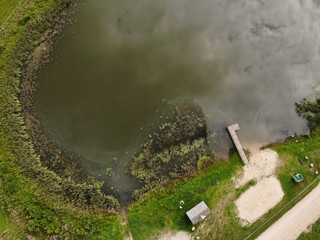 Fototapeta na wymiar Aerial view of natural beach near lake in Kraziai