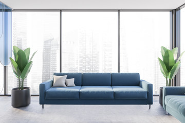Panoramic living room with blue couch