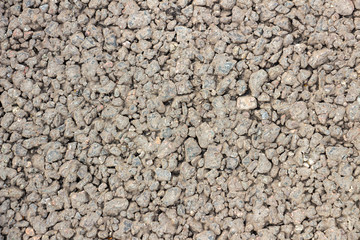 Brown asphalt texture, close-up