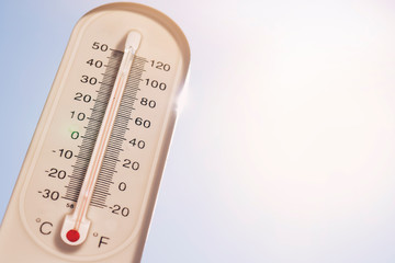 Heat, thermometer shows the temperature is hot in the sky, Summer