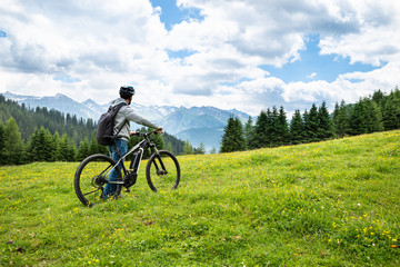 Main On Mountain With His Bike