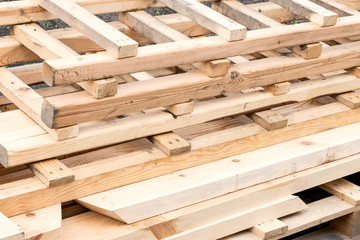 Many Wooden ladders. Stack of wooden stairs in the store