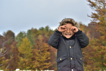Cute boy traveling in Slovenia in the fall