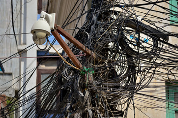 Big tangle of dirty black wires in Kathmandu, Nepal