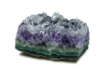 Isolated purple amethyst crystal. Natural Druse of purple amethyst crystal on a white background.