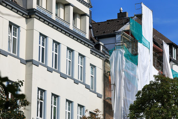 Sanierung eines Stadthauses, Bau von Luxuswohnungen