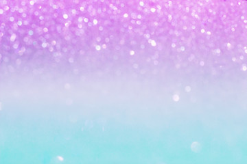 Gradient shiny background with space for text or design. Pastel colors. Smooth transition between colors. The combination of pink and blue. Selective focus. Festive background. Christmas and new year.