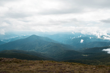 Fototapeta premium Mountain ranges in the fog