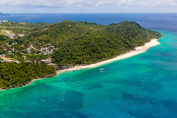 Aerial view from the drone on the landscape tropical sand beach with palm trees. Summer vacation consept.