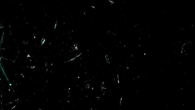 Real glass side break in super slow motion isolated on black background, 1000fps. Shooted with high speed camera at 4K.
