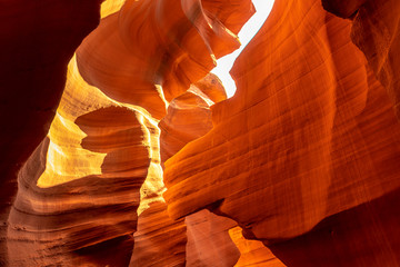 Mix of orange and red textures in Lower Antelope and the blue sky above in Arizona. United States