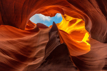 A beautiful arch with a mixture of red, orange and purple curves in Lower Antelope, Arizona. United...