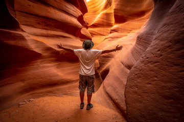 A young tourist admiring the beauty of Lower Antelope