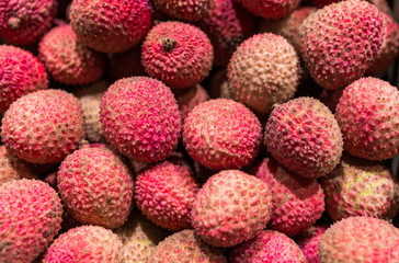 Close up food photo of organic lychee exotic fruit at the farmers market stall
