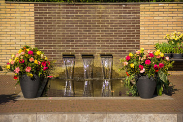 Keukenhof, Lisse, Netherlands - 18 April 2019: The view of different corners of the Keukenhof park, the worlds largest flower and tulip garden park in Holland.