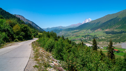 Beautiful view from Svaneti, castles in old village. Peak Ushba, Mestia, Mulakhi, Georgia.