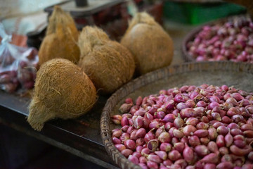 Coconut and red onion sale in traditional market