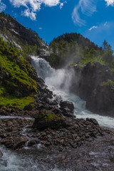 Latefossen (Latefoss) twin waterfall - one of the biggest waterfalls in Norway, nearby Odda. HDR image, july 2019