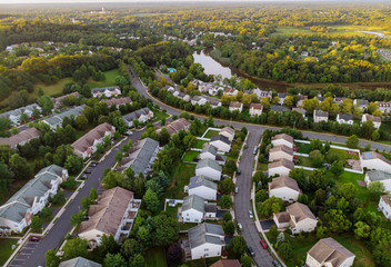 Obraz premium Sunrise over apartment buildings in the suburbs, the view