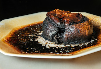 Pastry meat pie completely charred and burned after leaving in the microwave oven too long