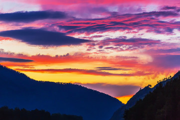 Sunset over mountains. Katun River, Gorny Altai, Siberia, Russia