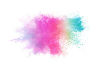 Freeze motion of colorful color powder exploding on white background.  Paint Holi.