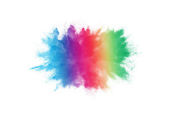 Freeze motion of colorful color powder exploding on white background.  Paint Holi.