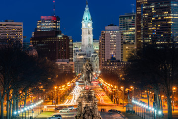 Scene of George Washington statue oand street in Philadelphia over the city hall with cityscape...