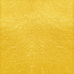 Shiny yellow leaf gold foil texture background