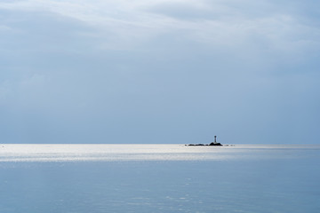 Blue sky with clouds over sea water. Nature composition.