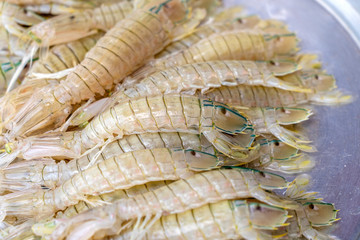 Sea fresh shrimps at street market in Thailand. Seafood concept.