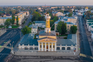 Scenic aerial view of the Fire tower in historical center of ancient town Kostroma in Russian Federation. Beautiful summer look of old building in old part of capital of russian province
