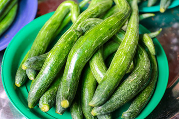 Zucchini placed as a pile in the tray, Non-toxic fresh vegetables.