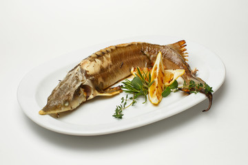 baked pike with a lemon