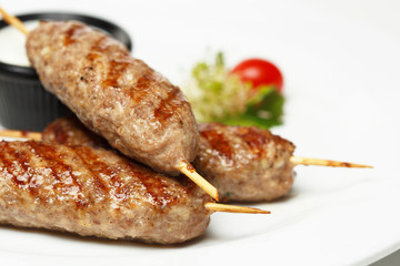 Lula kebab grill with sour cream garlic sauce