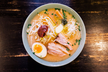 Top view of Chashu Pork in Ramen Pork Bone and Spicy Paste Soup (Kara Miso Ramen) with Chashu Pork,...
