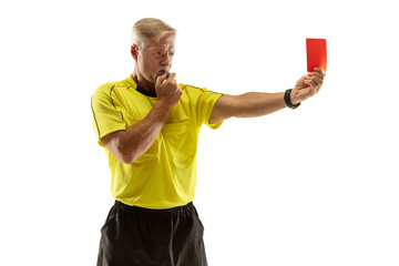 Referee showing a red card to a displeased football or soccer player while gaming isolated on white...
