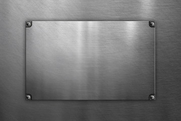 Polished steel plate on metal background