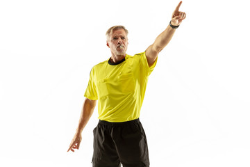 Referee gives directions with gestures to football or soccer players while gaming isolated on white...