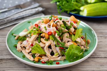Steamed rip chicken spicy salad with shallot, celery, chili and Scallion.