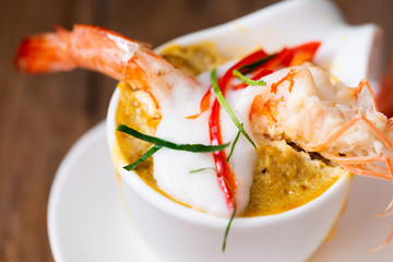 Steamed Seafood Curry Cakes with coconut cream and Prawn.