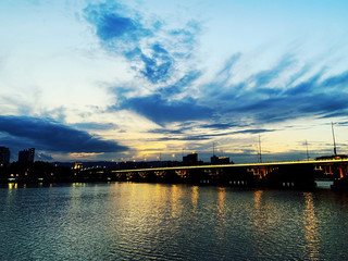 Fototapeta na wymiar Beautiful bridge in Fen River Park at dusk