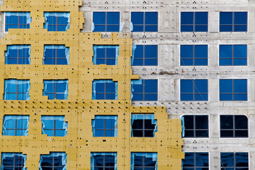 Construction of external wall thermal insulation with rock wool. Exterior passive house wall heat...