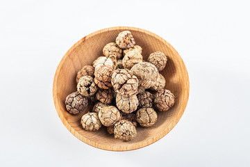 Chinese food commonly used spicy cooking seasoning spices, a dish of cardamom on a white background
